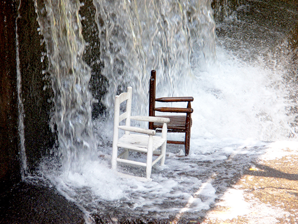 Easy Chairs on a Hot, Summer Day by Carl LaVO.